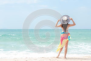 Summer Vacation.  Traveler women relaxing and joy fun on the beach, so happy and luxury and destination in holiday summer.