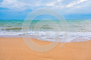 Summer vacation view of the blue sky with beautiful sea. wave ocean on sandy beach. for travel in the holidays. nature background