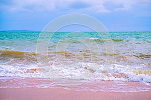 Summer vacation view of the blue sky with beautiful sea. wave ocean on sandy beach. for travel in the holidays. nature background