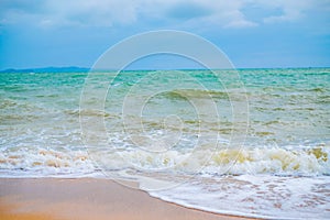 Summer vacation view of the blue sky with beautiful sea. wave ocean on sandy beach. for travel in the holidays. nature background