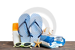 summer, vacations, beach accessories on wooden table with isolated background. Perspective with copy space for text