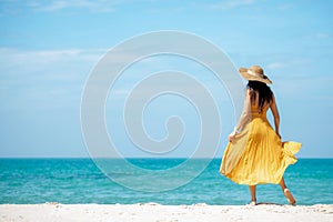 Summer vacations. Lifestyle woman relax and chill on beach background.