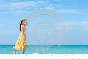 Summer vacations. Lifestyle woman relax and chill on beach background.