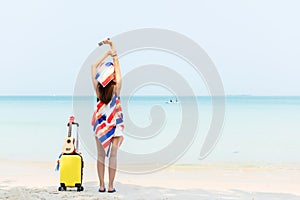 Summer vacations. Lifestyle woman relax and chill on beach background.