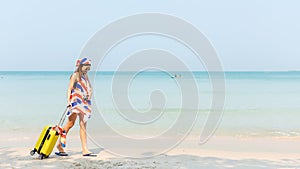 Summer vacations. Lifestyle woman talk a photo and relax chill on beach background.