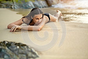 Summer Vacations. Woman Lying On Beach. Healthy Lifestyle. Travel, Wellness.