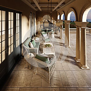 Summer veranda in a classic style with columns and stone floors with wicker furniture and illuminated by the evening sun