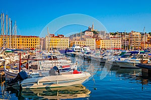 Summer view on basilica of Notre Dame de la Garde and old port in Marseille, France