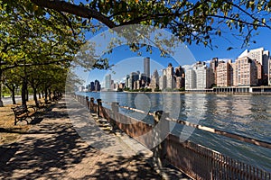 Summer view on Manhattan Midtown East skyscrapers from Roosevelt Island. New York City