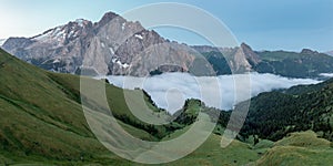 Summer view of Marmolada (Punta Penia), the highest peak in Dolomites, Italy.