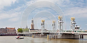 Summer view of the river IJssel with entrance bridge of the Hanseatic historic city of Kampen, The Nertherlands