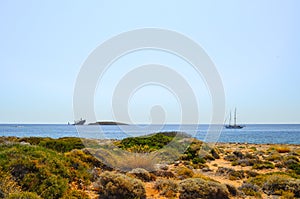 Ship wreck `Nordland` and yacht, Diakofti Kythera, Greece. photo