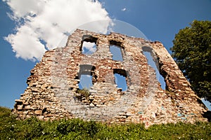 Summer view to castle ruins in Buchach with beautiful sky and clouds, Ternopil region, Ukraine