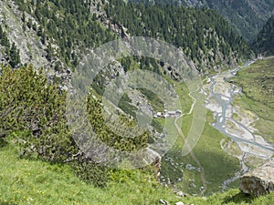 Summer view of winding Sulzenau spring Sulzenaubach and Sulzenaualm hut, Alpine mountain valley in Stubai Austrian Alps