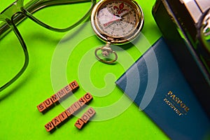 Summer waiting you message written on wooden blocks.