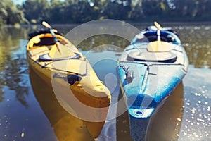 A summer walk along the river on kayaks on a sunny day.