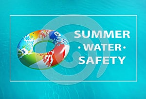 Summer water safety. Inflatable ring floating in swimming pool