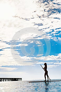 Summer Water Sports. Woman Silhouette In Sea. Healthy Lifestyle.
