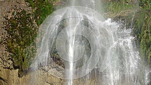 Summer Waterfall Close Up in Sunlight. Slow Motion