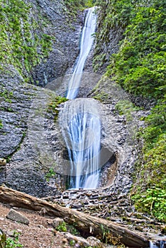 Summer waterfall on the rock