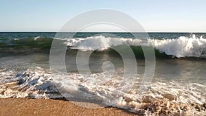 Summer waves break on a warm California Beach