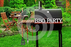 Summer Weekend BBQ Scene With Charcoal Grill On The Backyard
