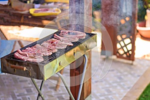 Summer Weekend BBQ Scene On The Patio Backyard,Grill And Table On Porch Deck.