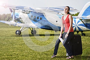 Summer woman dreaming about a travel