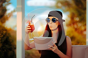 Summer woman Wearing Bandana and Sunglasses with PC Tablet