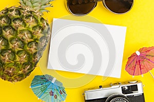 Summertime background blank card with pineapple sunglasses and cocktail umbrella