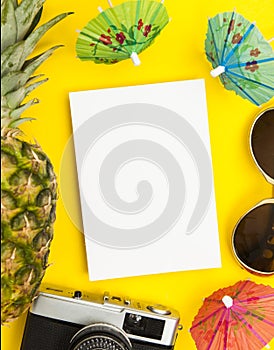 Summertime background blank card with pineapple sunglasses and cocktail umbrella