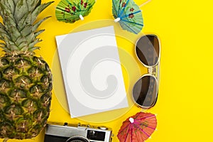 Summertime background blank card with pineapple sunglasses and cocktail umbrella