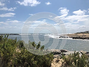 Summertime at the beach with blue skies