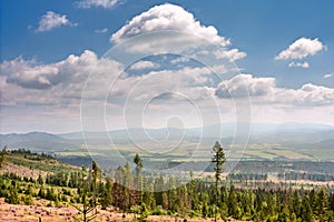 Summertime landscape with view of the Poprad River valley, mountains High Tatras