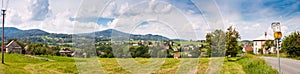 Summertime rural landscape banner, panorama - Moravian-Silesian region against the background of mountains Western Carpathians