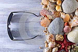 Sea vacation background with star fish and shells .