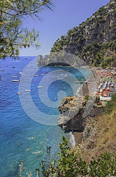 Summertime sescape: Amalfi Coast Costiera Amalfitana.The best beaches in Italy:Positano seaside Campania.Fornillo beach set in