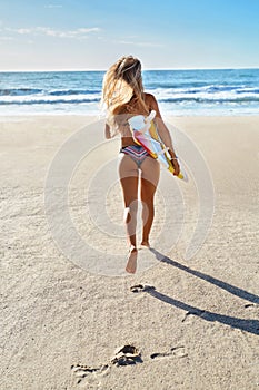 Summertime. Surfing. Summer Sport. Woman With Surfboard Running
