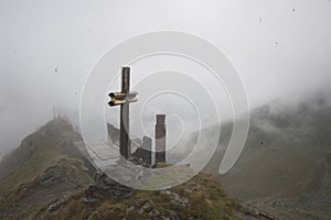 summit cross as religious symbol on mountain top