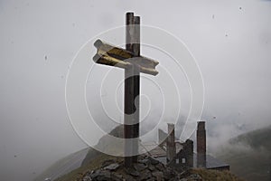 summit cross as religious symbol on mountain top