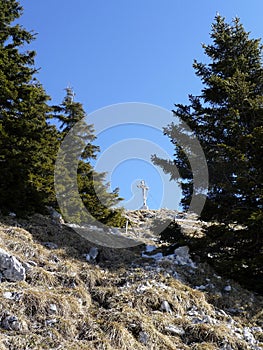 Summit cross of Breitenstein mountain, Bavaria, Germany, in wintertime