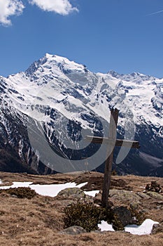 Summit Cross in front of Ortles Glacier, Italy