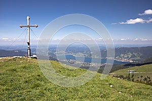 Summit cross on the Hirschberg peak in Bavaria, Germany