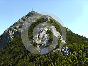 Summit cross of mountain Aiplspitz in Bavaria, Germany