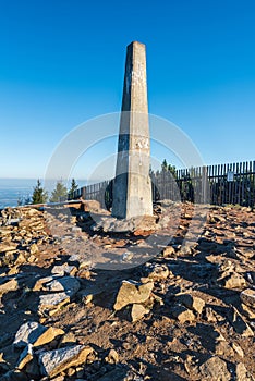 Summit of Lysa hora hill with column in Moravskoslezske Beskydy mountains in Czech republic