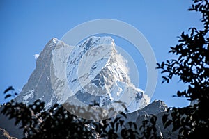 The summit of Machapuchare mountain in the Himalayas