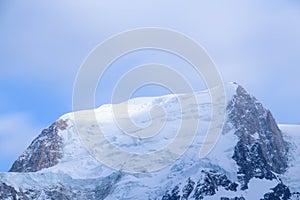 The summit of Mont Blanc du Tacul in Europe, France, the Alps, towards Chamonix, in spring, on a sunny day