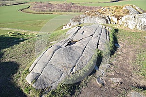 The summit rock used for coronations of the ancient kings at Dunadd Fort, Argyll, Scotland