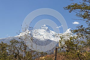The summits of the snowy Huandoy (6 395 masl) in Caraz, Huaylas, Ancash - Peru photo
