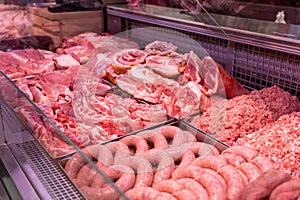Sumy, Ukraine - December 21, 2023: Meat products store. Sausages on display at a grocery store